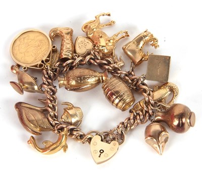 Lot 185 - A 9ct charm bracelet, the curblink bracelet...