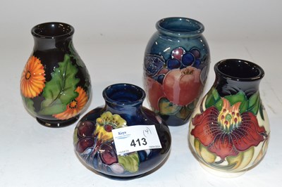 Lot 413 - A group of four small baluster shape Moorcroft...