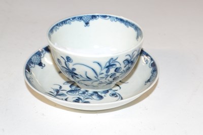 Lot 427 - A Lowestoft porcelain tea bowl and saucer with...