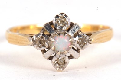 Lot 38 - An 18ct opal and diamond ring, the central...