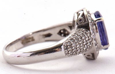 Lot 2 - An 18ct white gold tanznite and diamond ring,...