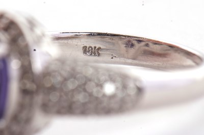 Lot 2 - An 18ct white gold tanznite and diamond ring,...