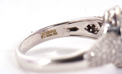 Lot 2 - An 18ct white gold tanznite and diamond ring,...