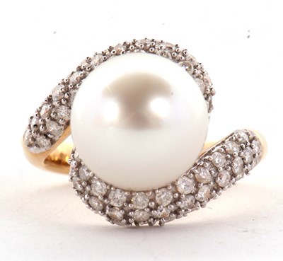 Lot 9 - An 18ct cultured pearl and diamond ring, the...