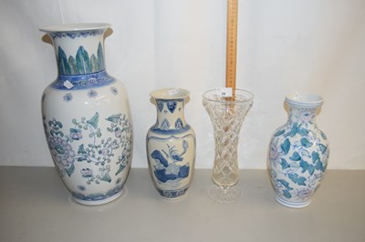 Lot 29 - Three modern Oriental vases and a glass vase (4)