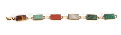 Lot 119 - A gemset bracelet, the rectangular sugar loaf...