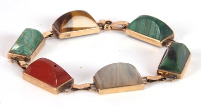 Lot 119 - A gemset bracelet, the rectangular sugar loaf...