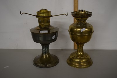 Lot 175 - Two brass oil lamps