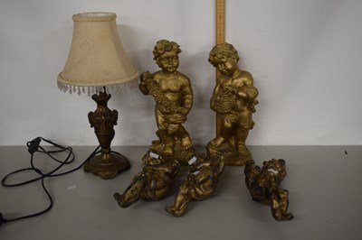Lot 181 - Group of various cherub models and a table lamp