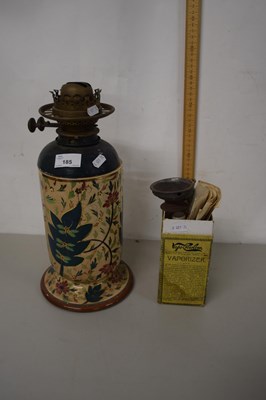 Lot 185 - Ceramic based oil lamp together with a vintage...