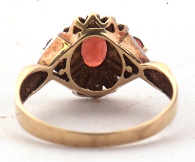 Lot 62 - A 9ct garnet and diamond ring, set with a...