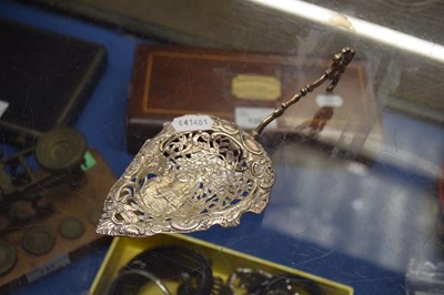 Lot 127 - A continental white metal straining spoon