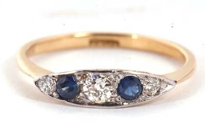 Lot 55 - A sapphire and diamond ring, the marquise...