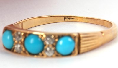 Lot 105 - A turquoise and diamond ring and faux...