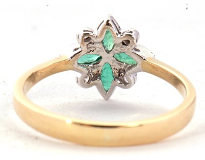Lot 37 - An 18ct emerald and diamond ring, the four...