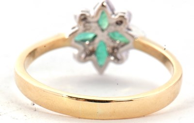 Lot 37 - An 18ct emerald and diamond ring, the four...