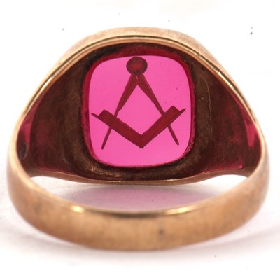 Lot 31 - A 9ct Masonic ring, the red glass panel with...