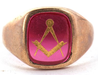 Lot 31 - A 9ct Masonic ring, the red glass panel with...