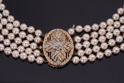 Lot 356 - A five strand cultured pearl necklace with an...