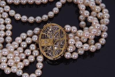 Lot 356 - A five strand cultured pearl necklace with an...