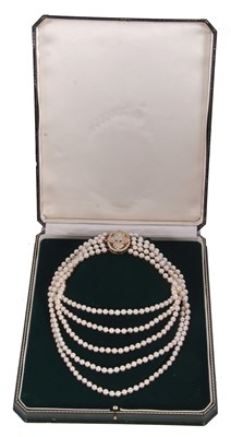 Lot 356 - A five strand cultured pearl necklace with an...