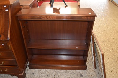 Lot 296 - A reproduction mahogany open front bookcase...