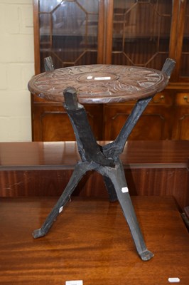 Lot 299 - A small African hardwood folding occasional table