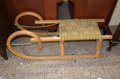 Lot 324 - A vintage wooden framed sleigh