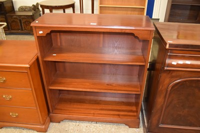 Lot 355 - A reproduction mahogany veneered open front...