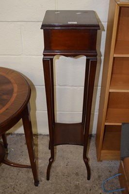 Lot 377 - An early 20th Century two tier plant stand