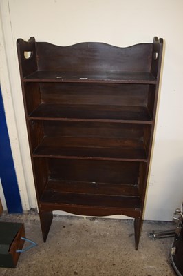 Lot 380 - An early 20th Century open front bookcase cabinet