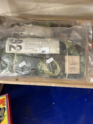 Lot 581 - Two pairs of shrink wrapped camoflauge trousers