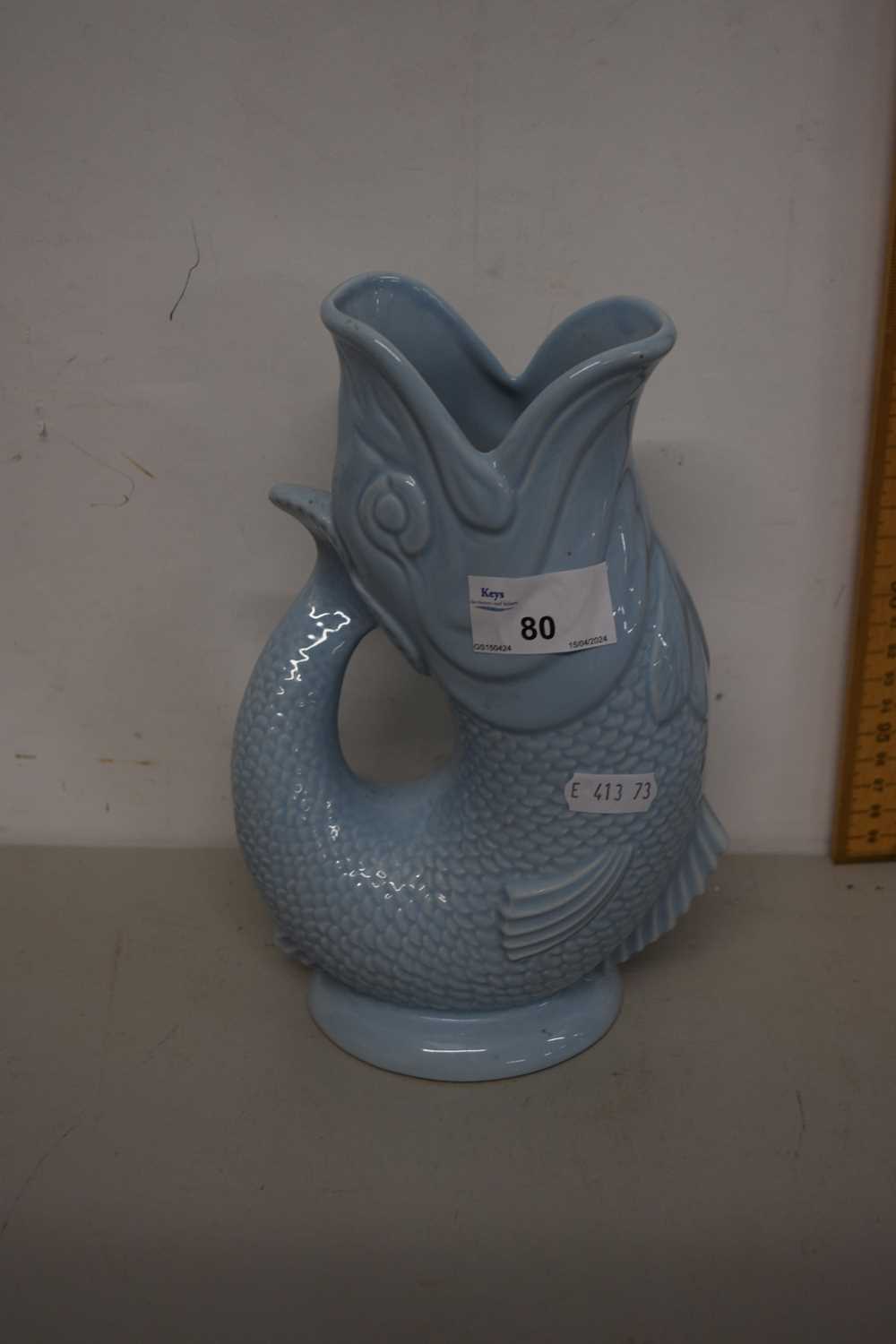 Lot 80 - Pale blue glazed Wade gurgle jug of fish form