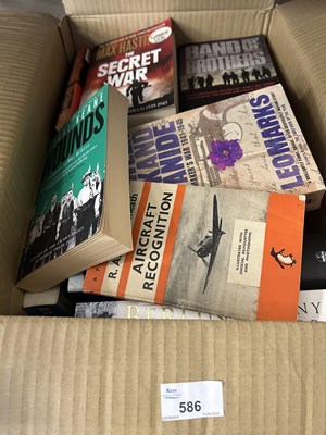 Lot 586 - Box of assorted paperbacks to include military...