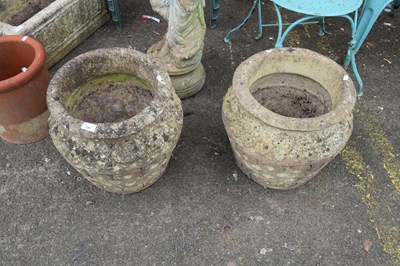 Lot 390 - Cotswold Studios, pair of concrete circular...