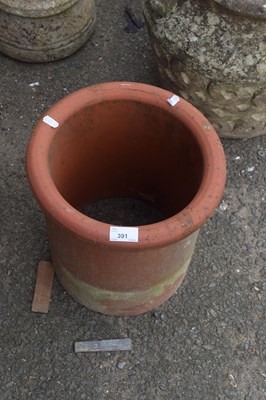 Lot 391 - A short terracotta chimney pot, 31cm high