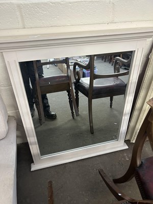 Lot 768 - A cream painted wall mirror