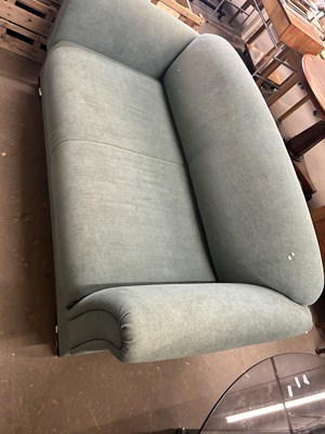 Lot 780 - A green two seater sofa