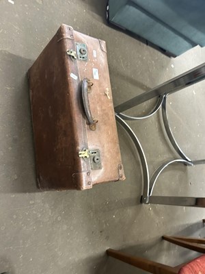 Lot 784 - A leather suitcase