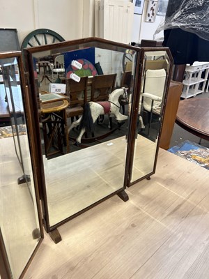 Lot 820 - A three fold dressing table mirror