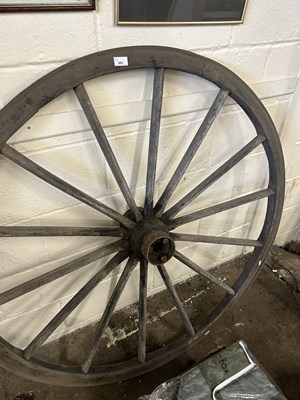 Lot 883 - A cart wheel