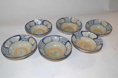 Lot 448 - Six Oriental pottery bowls with painted blue...