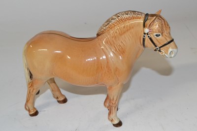 Lot 460 - A Beswick model of a Norwegian Fjord horse in...