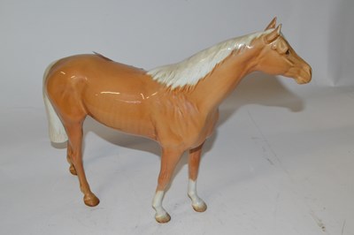 Lot 461 - A Beswick model of a Palomino mare in a gloss...