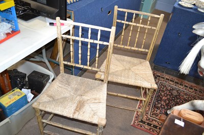 Lot 527 - A pair of Georgian faux bamboo and rush seated...