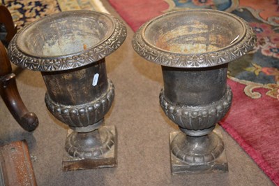 Lot 548 - A pair of reproduction small cast iron garden...