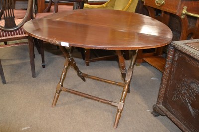 Lot 561 - A late 19th Century mahogany coaching table of...