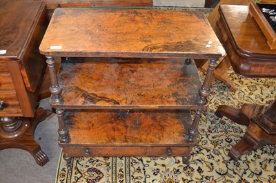 Lot 582 - A Victorian walnut veneered three tier shelf...