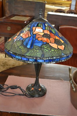 Lot 586 - A reproduction Tiffany style table lamp with...