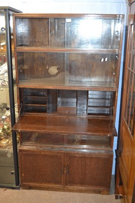 Lot 572 - A Minty vintage oak stacking combination...